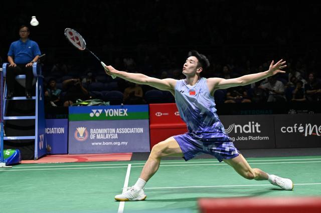 1736433503373054825.jpg (体育)(12)羽毛球——马来西亚公开赛:李诗沣晋级XxjpseC007299_20250109_PEPFN0A001.jpg